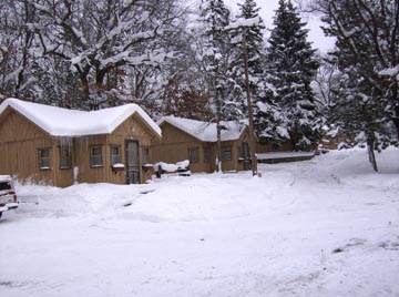 cabins in winter in the manistee forest